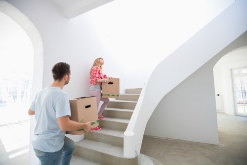 Professional team handling office relocation equipment in Blackwall